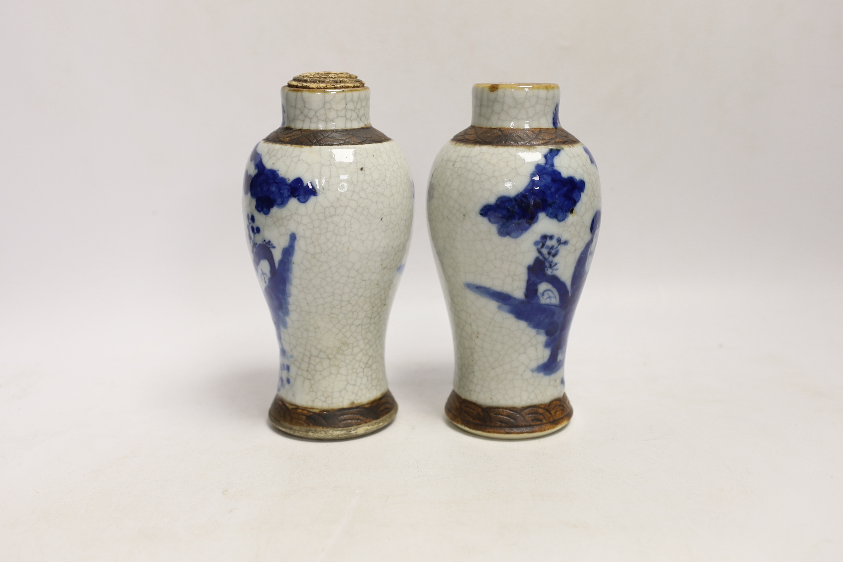 A pair of Chinese blue and white crackle glaze vases, late 19th century, 17cm